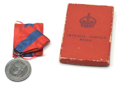 Lot 63 - Boxed GRVI Imperial Service Medal impressed to...