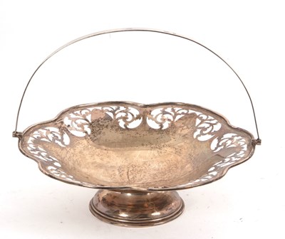 Lot 25 - George V silver swing handle fruit dish of...