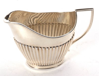 Lot 62 - A sterling "Black, Starr & Frost" cream jug...