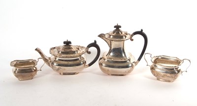 Lot 63 - George V silver four piece tea service of...