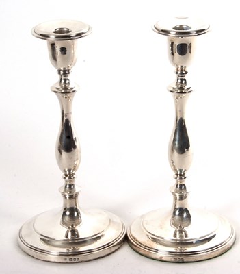 Lot 68 - Pair of hallmarked silver candlesticks of...