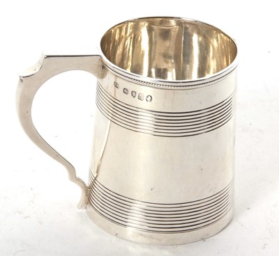 Lot 73 - George III silver mug of slight tapering...