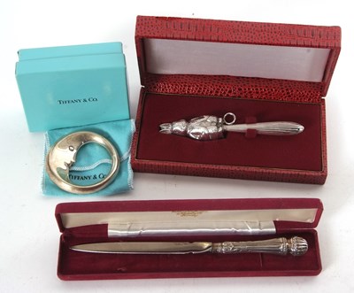 Lot 83 - Mixed Lot: A Tiffany & Co sterling "Man in the...