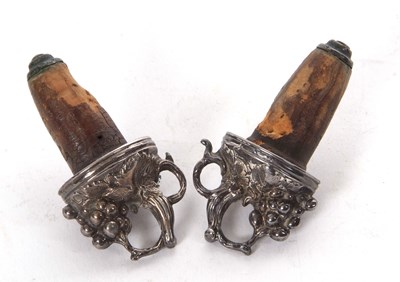 Lot 184 - Pair of vintage silver plated bottle stops...