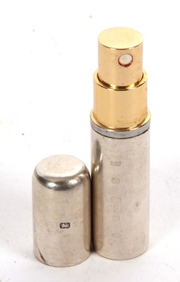 Lot 105 - Silver cased perfume atomiser of plain...