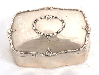 Lot 121 - An Edwardian silver ring box of shaped...