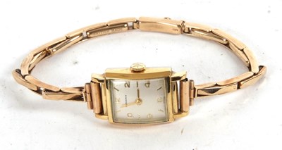 Lot 238 - A Huguenin ladies gold plated wristwatch, the...