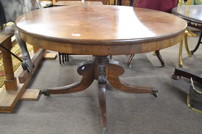 Lot 569 - A late Georgian mahogany pedestal dining table...