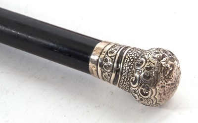 Lot 147 - Hallmarked silver cane, the pommel chased and...