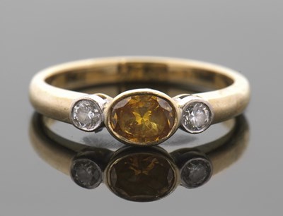 Lot 445 - A GIA certified fancy deep yellow-orange and...