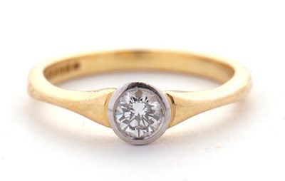 Lot 1 - An 18ct diamond solitaire ring, the round...