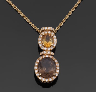 Lot 444 - An 18ct smokey quartz, citrine and diamond...