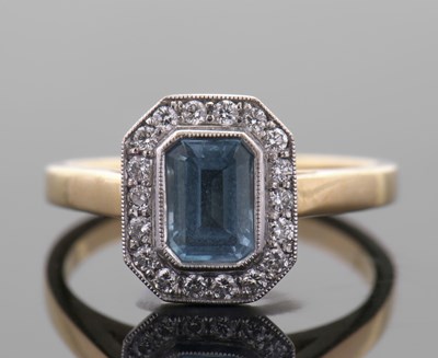 Lot 407 - An 18ct aquamarine and diamond ring, the...