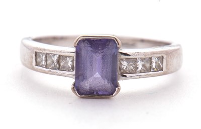 Lot 3 - An 18ct white gold tanzanite and diamond ring,...