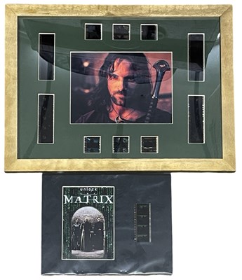 Lot 90 - A pair of film cell displays, to include The...