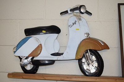 Lot 38 - A metal wall plaque formed as a vintage moped