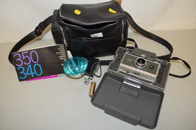 Lot 90 - Poloroid 340 camera with bag and accessories