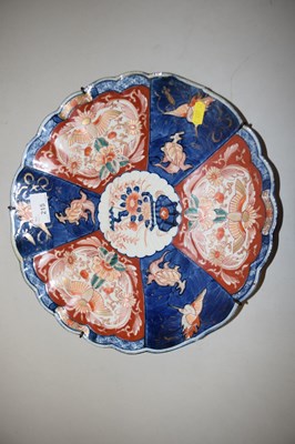 Lot 215 - An Imari charger