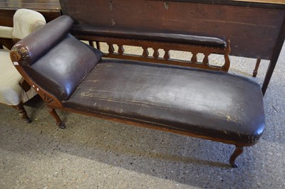 Lot 320 - Victorian chaise long with carved decoration...