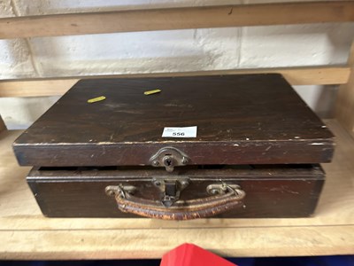 Lot 556 - Wooden storage box with tin plate miniature...