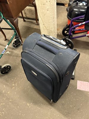 Lot 733 - Wheeled suitcase and a cycle excerciser (2)