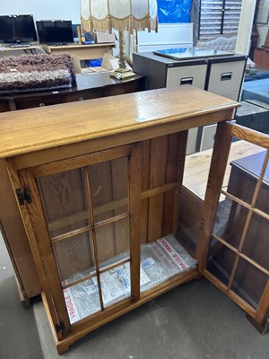 Lot 764 - 20th century oak glazed display cabinet