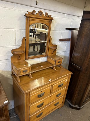 Lot 780 - Late Victorian American walnut mirror back...