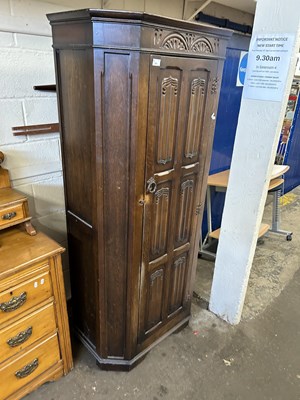 Lot 781 - Oak single door wardrobe with linen fold...