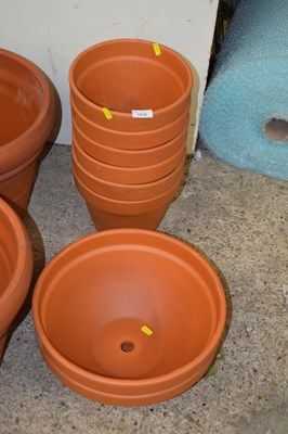 Lot 1036 - Six small terracotta planters together with...