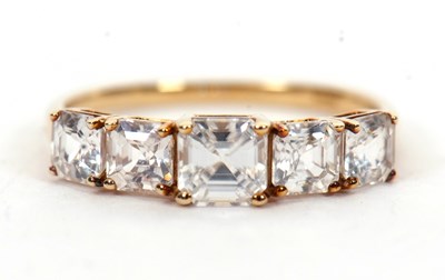 Lot 1 - A 9ct white zircon ring, the five graduated...