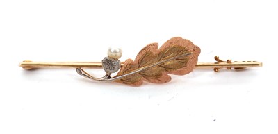 Lot 145 - A 15ct and 18ct cultured pearl oak leaf brooch,...