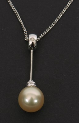 Lot 136 - An 18ct white gold, diamond and cultured pearl...