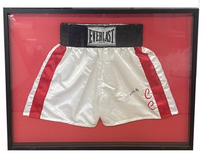 Lot 259 - A framed pair of Everlast shorts, bearing the...