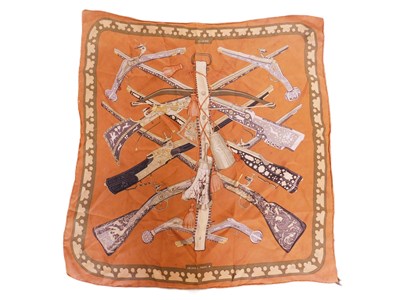 Lot 116 - An Hermes 'Diane' scarf, in shades of brown,...