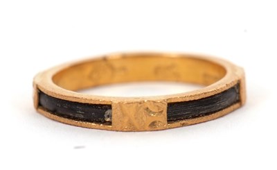 Lot 42 - A '916' gold ring, the rustic ring with dark...