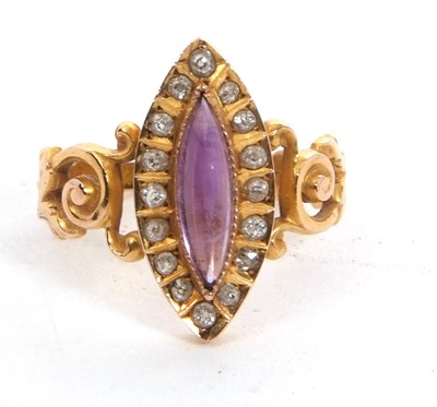 Lot 23 - An amethyst and diamond ring, the marquise...