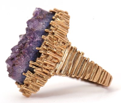 Lot 50 - A 9ct modernist amethyst ring, the oval...