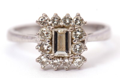 Lot 63 - An 18ct white gold and diamond ring, set to...