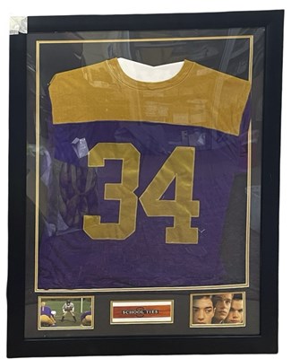 Lot 92 - A framed screen-used number 34 t-shirt from...