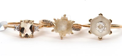 Lot 124 - Three gemset rings: to include a 9ct citrine...