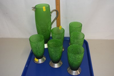 Lot 40 - Nick Munro, green glass and pewter lemonade set