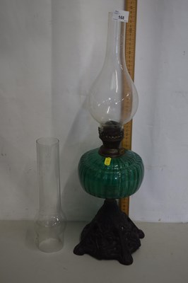 Lot 168 - Cast based oil lamp