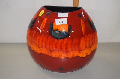 Lot 214 - Poole Pottery purse vase decorated in reds and...