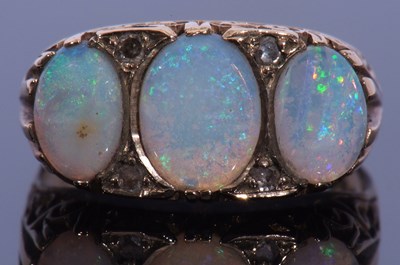 Lot 22 - 9ct gold opal and diamond ring, a design...