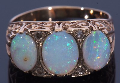 Lot 22 - 9ct gold opal and diamond ring, a design...