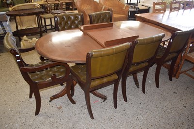 Lot 291 - Reproduction mahogany dining table and six...