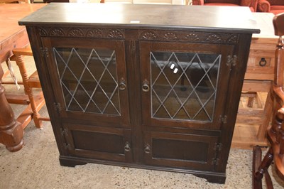 Lot 293 - Reproduction dark oak lead glazed bookcase...