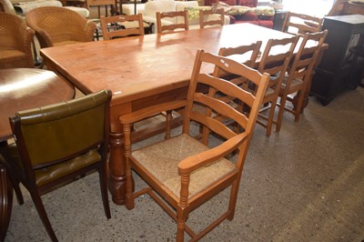 Lot 292 - Large pine dining table on turned legs...