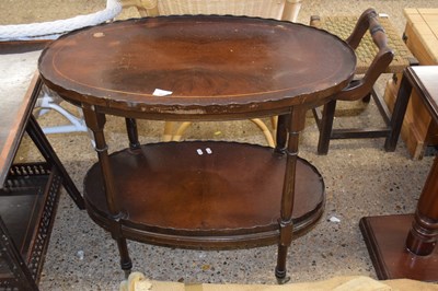 Lot 301 - Mahogany veneered oval two tier drinks trolley