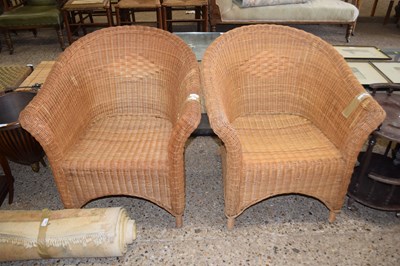 Lot 305 - A pair of wicker chairs